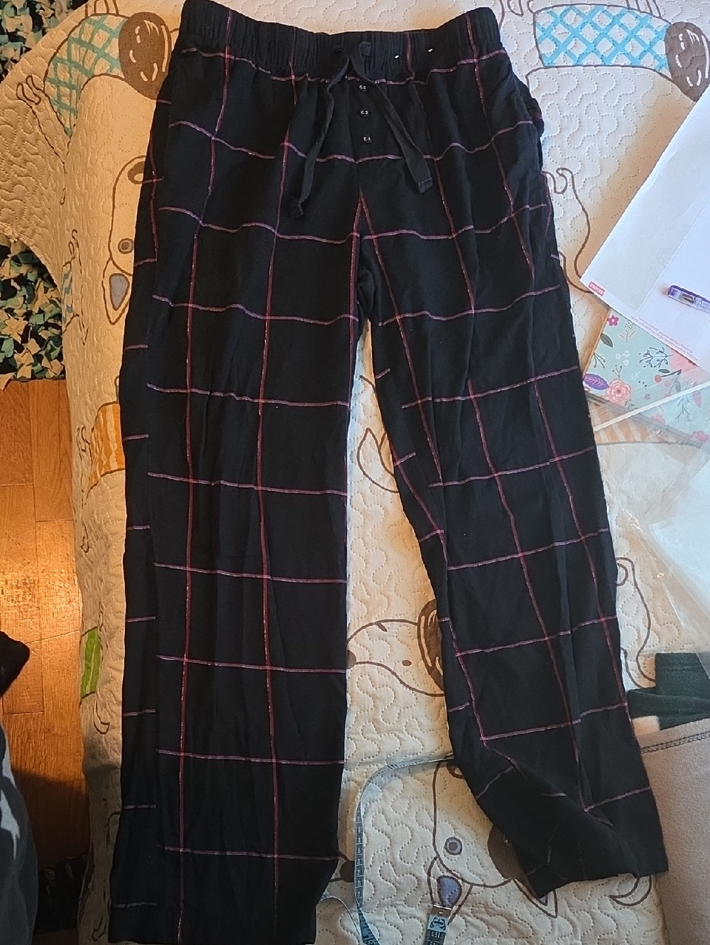 stars above Black Pajama Pants with Red Windowpane Grid